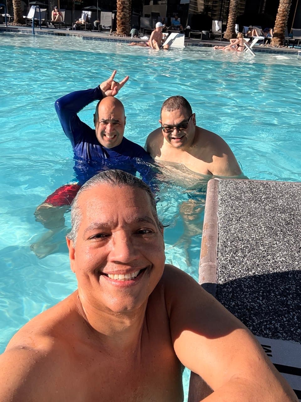 Richie, Gardy, and Alejo in the pool together