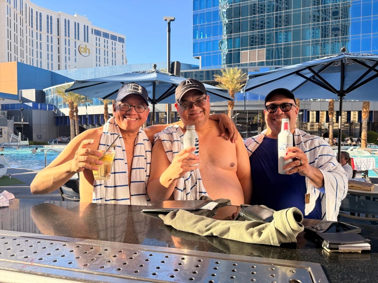 Poolside drinks with Richie, Alejo, and Gardy after swimming