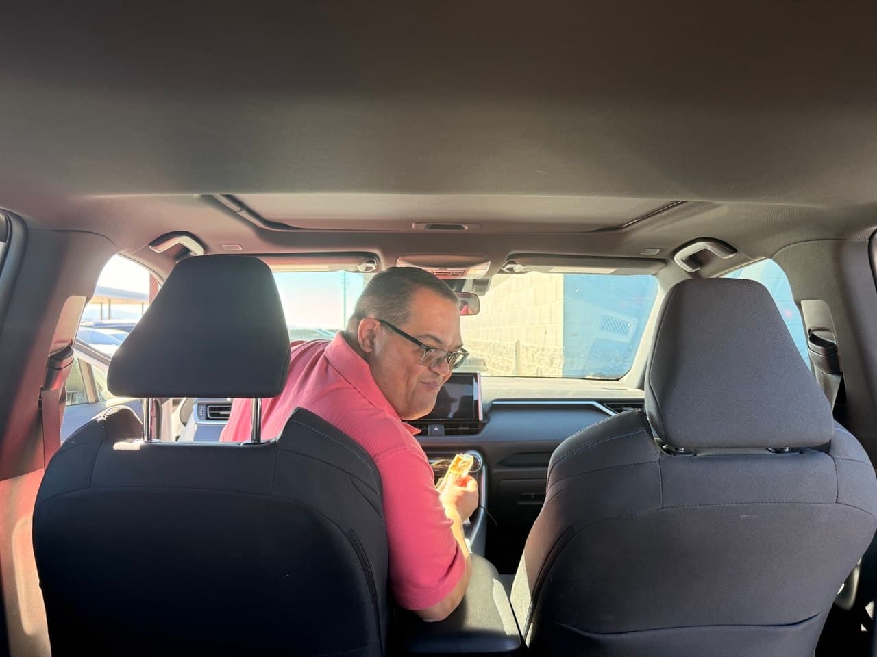 Alejo behind the wheel on the road trip