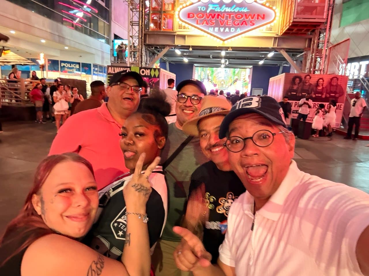 Photobomb moment at Fremont Street with two random creatures in the frame