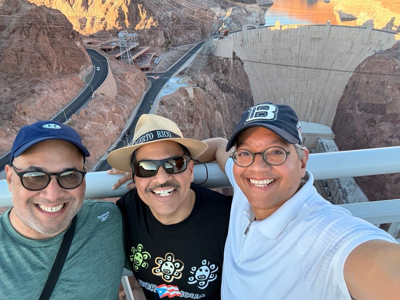 Gardy, El Cura, and Richie leaning on the bridge overlooking Hoover Dam