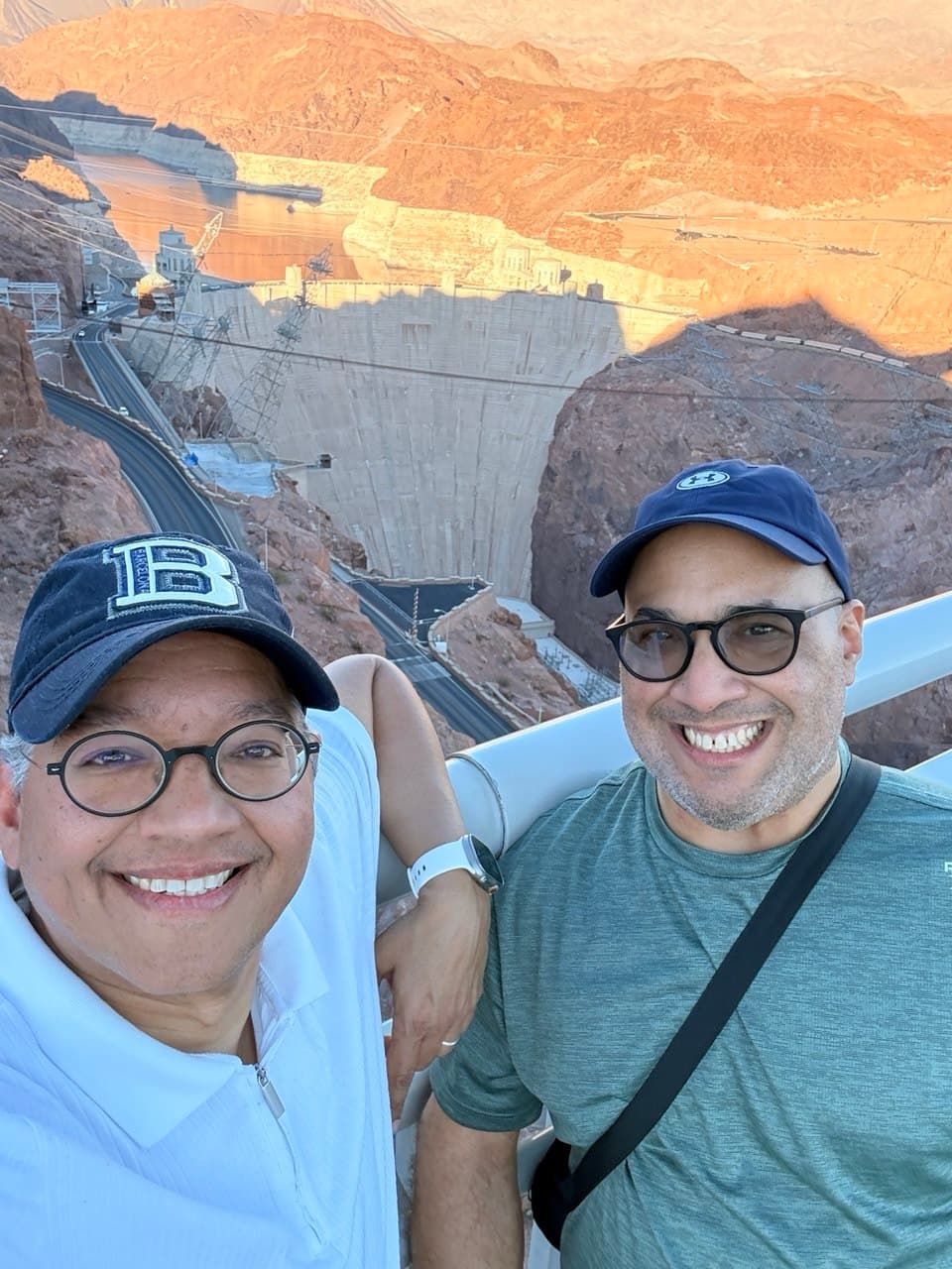Richie and Gardy golden hour selfie from the bridge over Hoover Dam