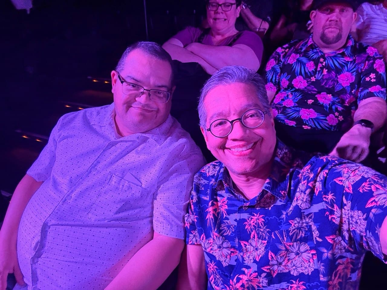 Alejo and Richie taking a selfie in the theater seats
