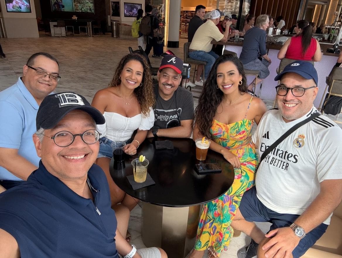 AI image of the group at the lobby bar with women approaching them